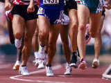 Detail of Runners Legs Competing in a Race Fotografie-Druck