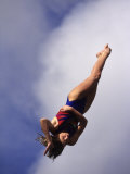 Women Diver Flying Through the Air, California, USA Photographic Print by Paul Sutton