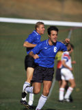 Soccer Player Celebrating after Scoring a Goal Photographic Print