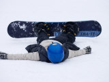 Female Snowboarder Collapsed after a Run, New York, USA Photographic Print by Paul Sutton