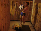 Man Changing in the Locker Room after Work Out Photographic Print