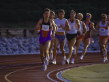 Male Runners Competing in a Track Race Lámina fotográfica