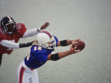American Football Player Reaching for the Ball Photographic Print