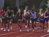 Female Runners at the Start of a Track Race Photographic Print