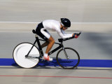 Action of Female Cyclist Competing on the Velodrome - Fotografik Baskı