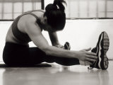 Woman Stretching During a Workout, New York, New York, USA Photographic Print by Paul Sutton