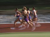 Male Runners Competing in a Track Race Lámina fotográfica