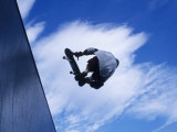 Skateboarder in Action over the Vert Photographic Print