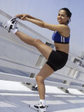 Woman Stretching Outdoors, New York, New York, USA Photographic Print by Chris Trotman
