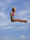 Women Diver Flying Through the Air, California, USA Photographic Print by Paul Sutton