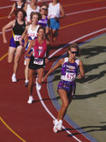 Female Runners Competing in a Track Race Photographic Print
