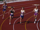 Female Runners Competing in a Track Race Photographic Print