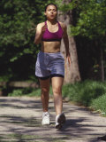 Woman Out on a Fitness Walk Lámina fotográfica por Paul Sutton Woman Out on a Fitness Walk Lámina fotográfica por Paul Sutton