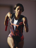 Female Runner Competing in a Track Race Photographie