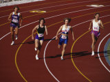 Female Runners Competing in a Track Race Photographic Print