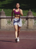 Woman Out on a Fitness Walk Photographic Print by Paul Sutton