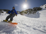 Snowboarder in Tuckerman Ravine, White Mountains National Forest, New Hampshire, USA Photographic Print by Jerry & Marcy Monkman