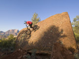 Mountain Biker on Natural Wall Ride, Rockville, Utah, USA Photographic Print by Chuck Haney