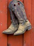 Worn Cowboy Boots Hanging, Ponderosa Ranch, Seneca, Oregon, USA Photographic Print by Wendy Kaveney