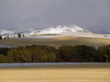 Early Snow Dusts Fields and Fall-Colored Trees Near Bozeman Photographic Print by Gordon Wiltsie Early Snow Dusts Fields and Fall-Colored Trees Near Bozeman Photographic Print by Gordon Wiltsie