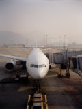 Jumbo Airplane Parked on the Tarmac at the Airport in Hong Kong Photographie par Eightfish 