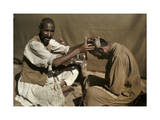 Afridi Barber Shaves a Fellow Tribesmen's Hair Photographic Print by Franklin Price Knott
