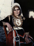 Woman Poses in the National Costume of Crete Photographie par Maynard Owen Williams