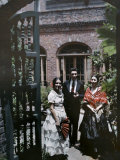 Three Creole Young Adults Stand in a Theater's Courtyard Photographic Print by Edwin L. Wisherd