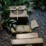 Stone Path Leads to a Stone Water Basin Used for Cleansing Photographic Print by Eightfish