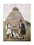 Three Men in Holiday Apparel Pose by a Large Hay Stack Photographic Print by Wilhelm Tobien
