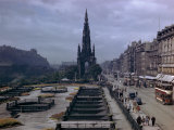 Pedestrians and Trams Pass Gardens and Memorial on Princes Street Photographic Print by B. Anthony Stewart