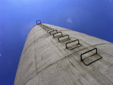 Rusted Metal Rungs Climb Skyward, Along the Length of a Concrete Silo Photographic Print by White & Petteway 