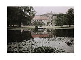 Brahetrolleborg Castle Is Reflected in the Water Surrounding It Photographic Print by Gustav Heurlin