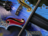 Bow Draws a Melody from the Strings of a Colorful, Painted Violin Photographic Print by White & Petteway 