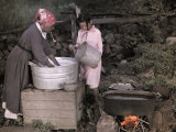 Woman and Child Do Laundry Outside in Sperryville Photographic Print by Charles Martin