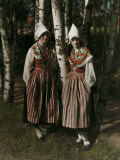 Two Leksand Women Stand Among the Birch Trees in Dalarna Photographic Print by Gustav Heurlin