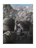 Pueblo Woman Puts Bread into an Oven in Preparation for Corn Dance Photographic Print by Franklin Price Knott