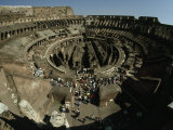 Elevated Interior View of Tourists in the Colosseum Photographie par Paul Chesley