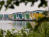 Colorful Floating Houses on the Waterfront in Holland Photographic Print by Mattias Klum