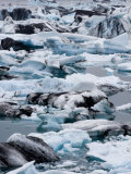 Multi-Colored Ice in the Water at the Vatnajokull Icefield Photographic Print by Mattias Klum
