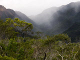 Scenic of Fog Rising from Mountains and Valley Photographic Print by Mattias Klum