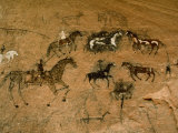Native American Art on a Rock Wall in Canyon De Chelly Photographie par Paul Chesley