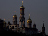 Gilded Church Domes and Crosses Gleam in Late Afternoon Light Photographie par Paul Chesley