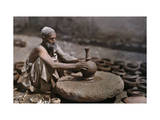 Man Works at His Potter's Wheel Photographic Print by Franklin Price Knott