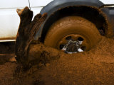 Tire Spinning in Deep Clay Mud Photographic Print by Mattias Klum