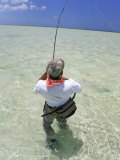 Bringing in Another Bonefish on the Flats of Acklins Island, Bahamas Photographic Print by Drew Rush