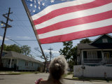 Woman with the Flag She Flew on Her Flooded Out Home in New Orleans Photographic Print by Tyrone Turner