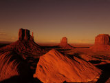 Buttes in Monument Valley at Sunset Photographic Print by Raul Touzon