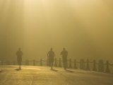 Runners in Fog at Dusk Near the Golden Gate Bridge Photographie par Skip Brown
