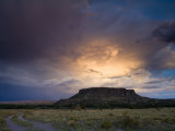 Storm Clouds over Sacred Ground at Black Mesa Photographic Print by Ralph Lee Hopkins